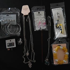 Silver and Gold Necklace Collection with Decorative Pendants